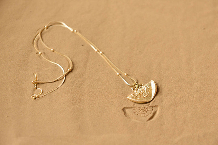 Fossil Pendent - Medium