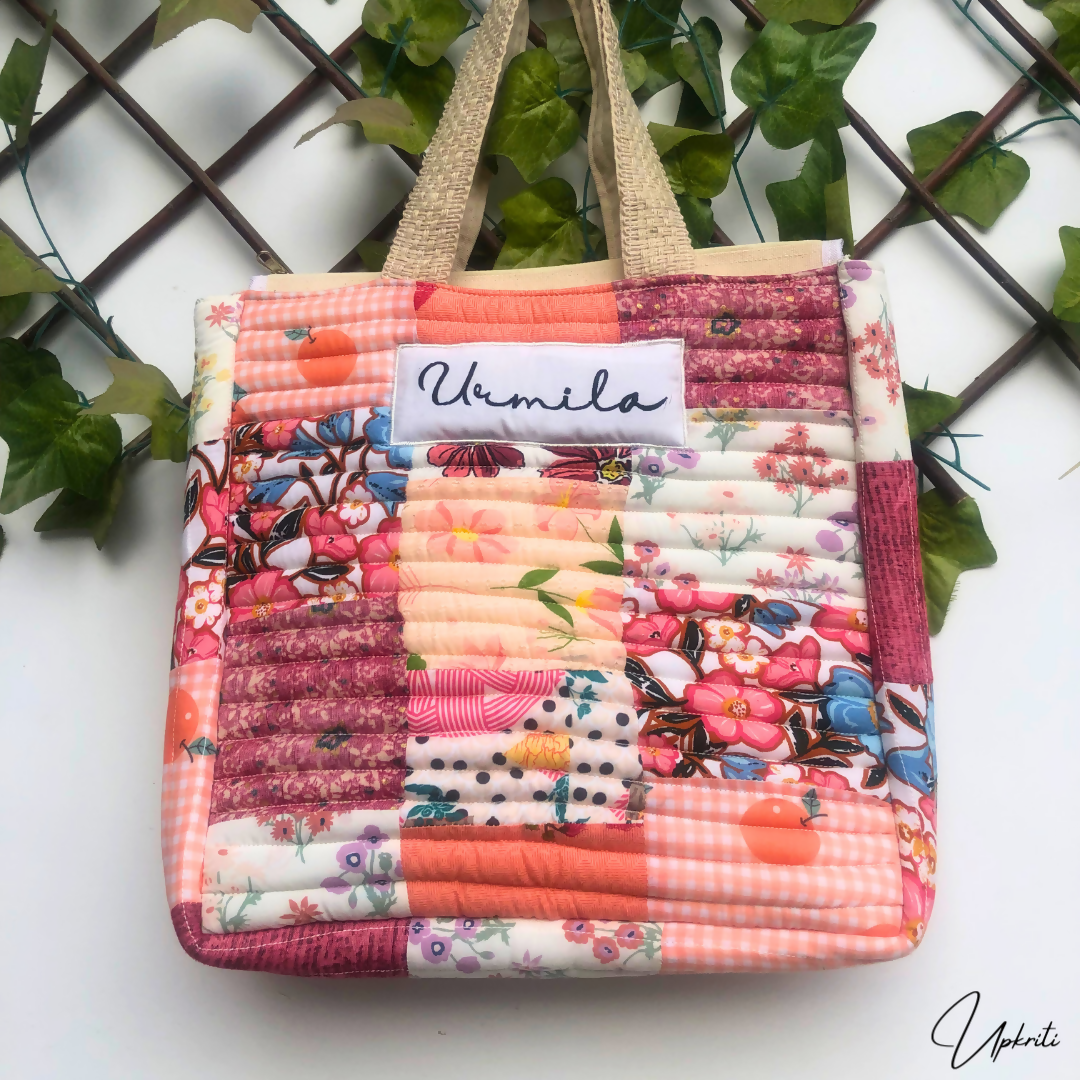 Shades of peach quilted tote bag