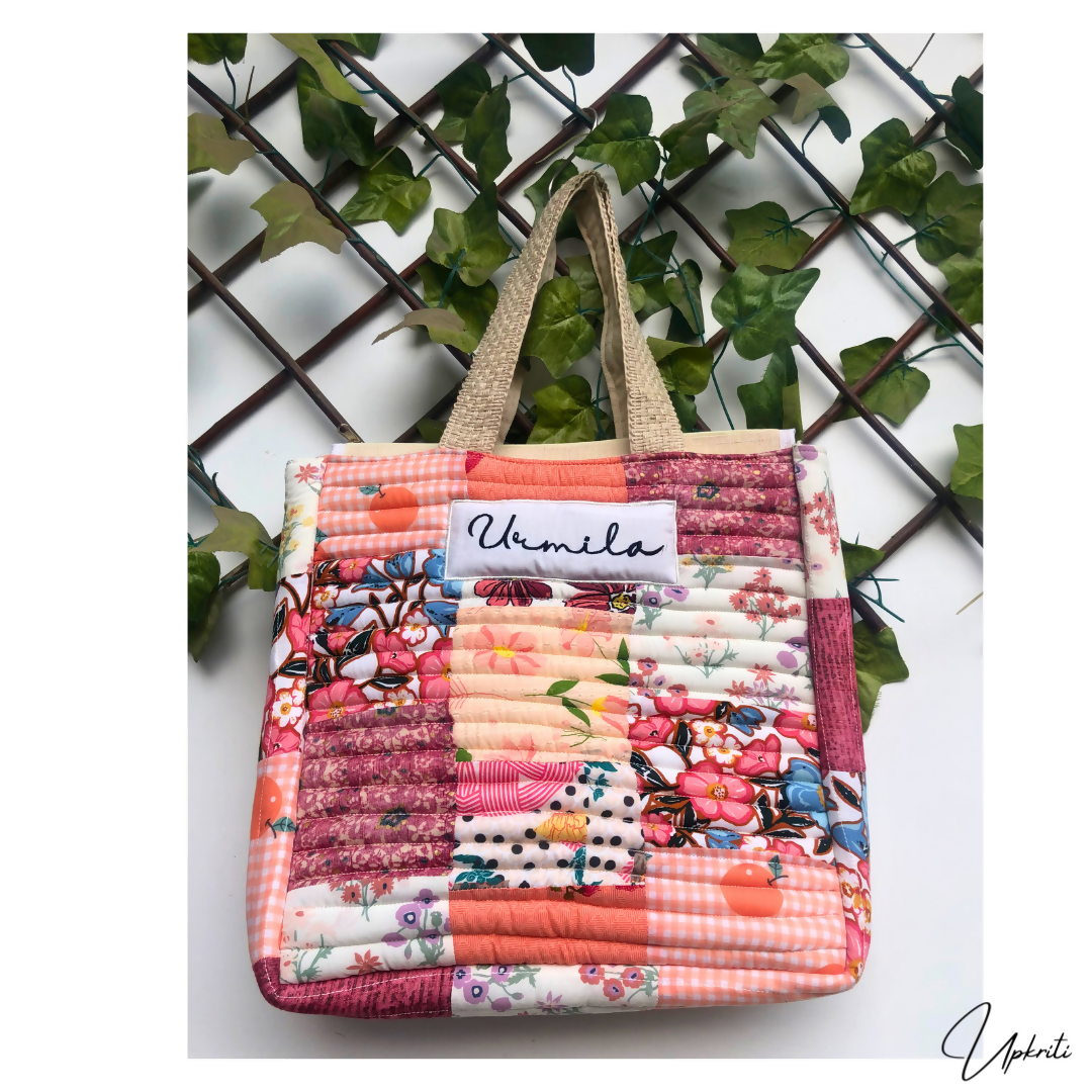 Shades of peach quilted tote bag