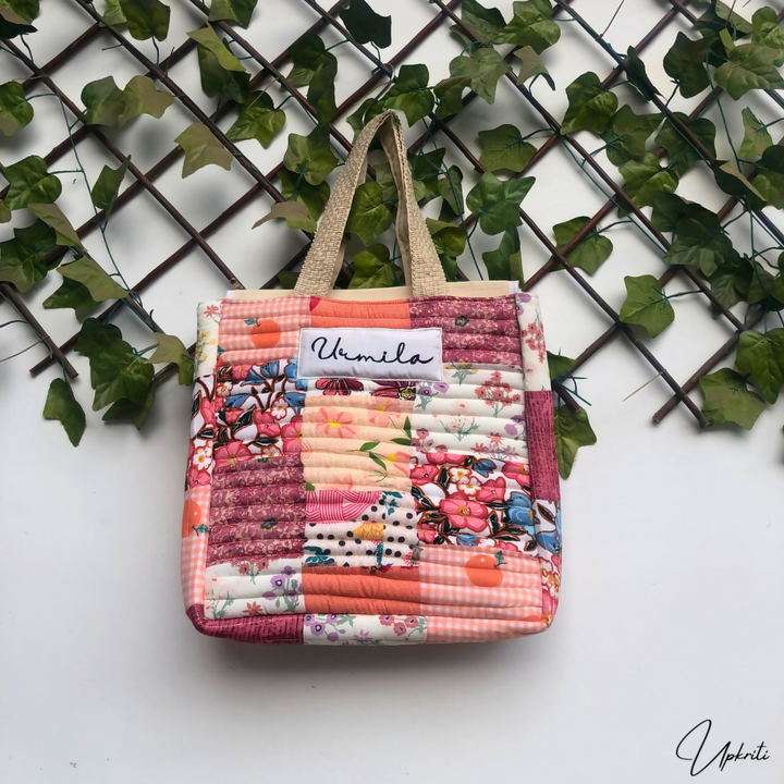 Shades of peach quilted tote bag