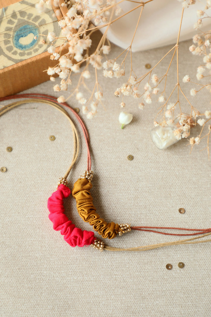 Pink And Yellow Artisanal Rakhi - Set Of 2