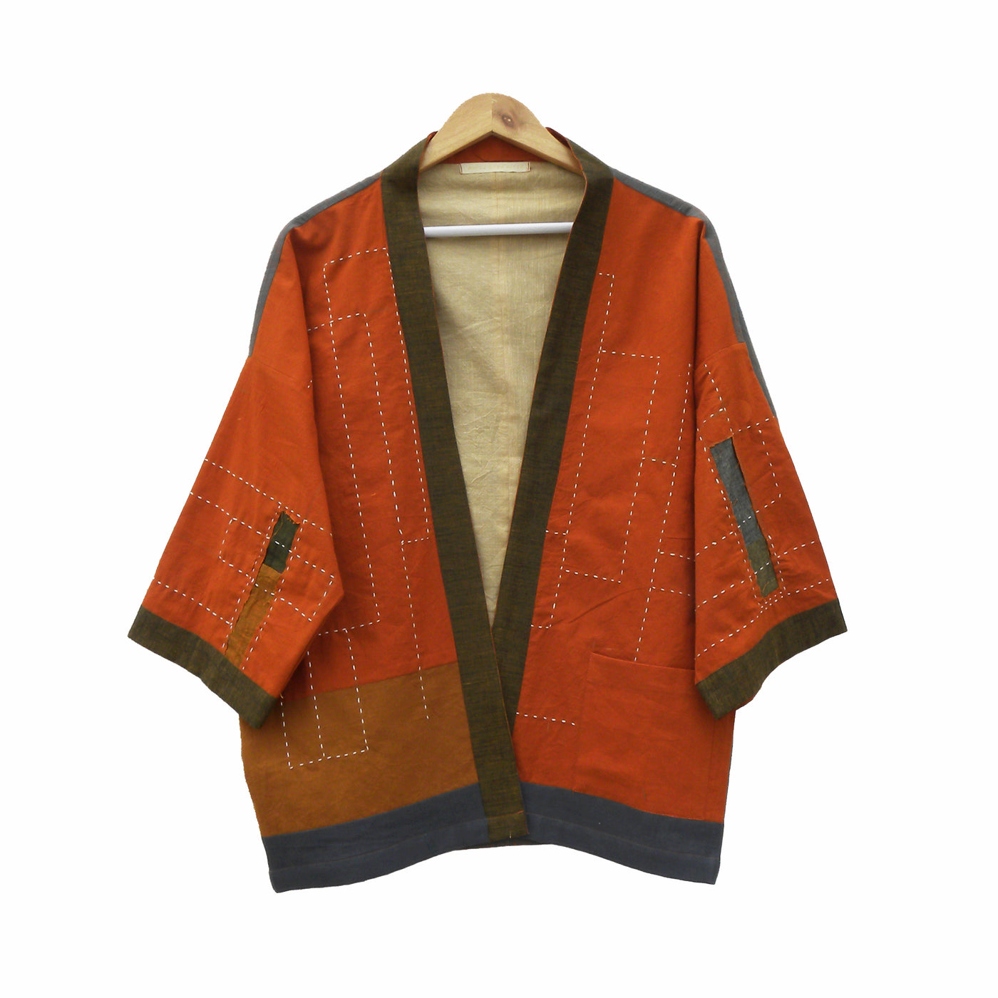 A versatile jacket in a brick orange colour