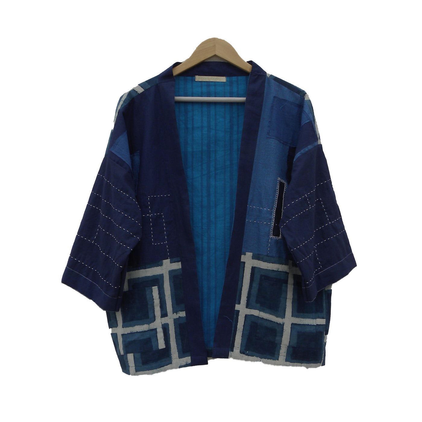 Jacket in blue colour enriched with Kantha hand embroidery, hand block print