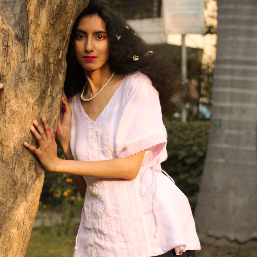 Chikankari peplum top, with hand embroidered beaded floral and lace details.