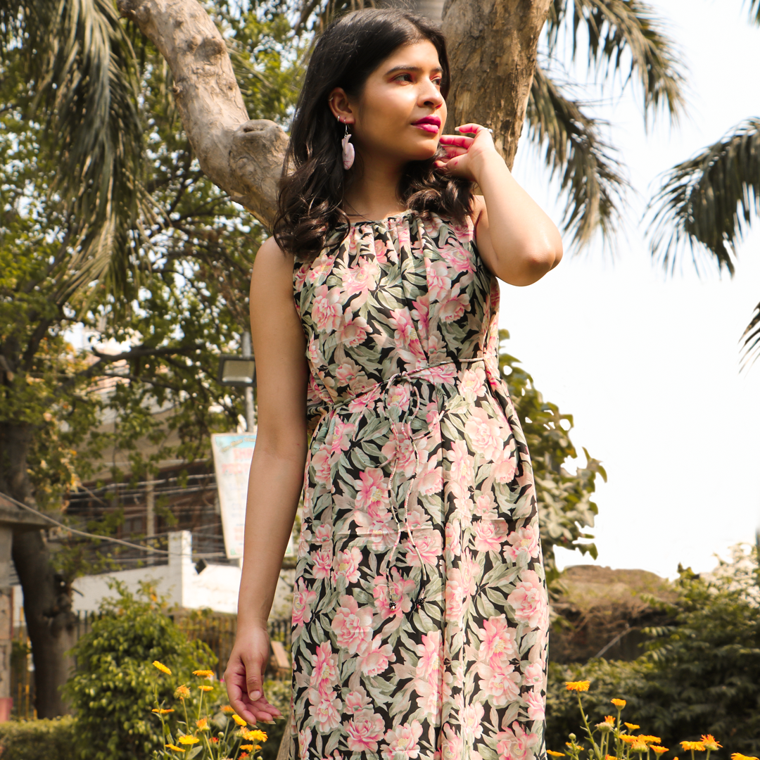 floral printed slip dress, with gathered details at the neckline, and drawstrings at the waist.