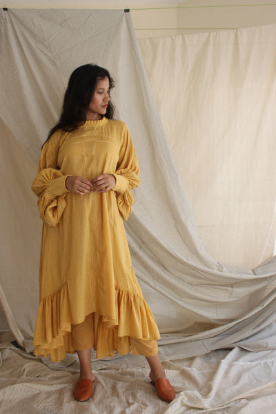 high low dress in yellow colour with a relaxed fit