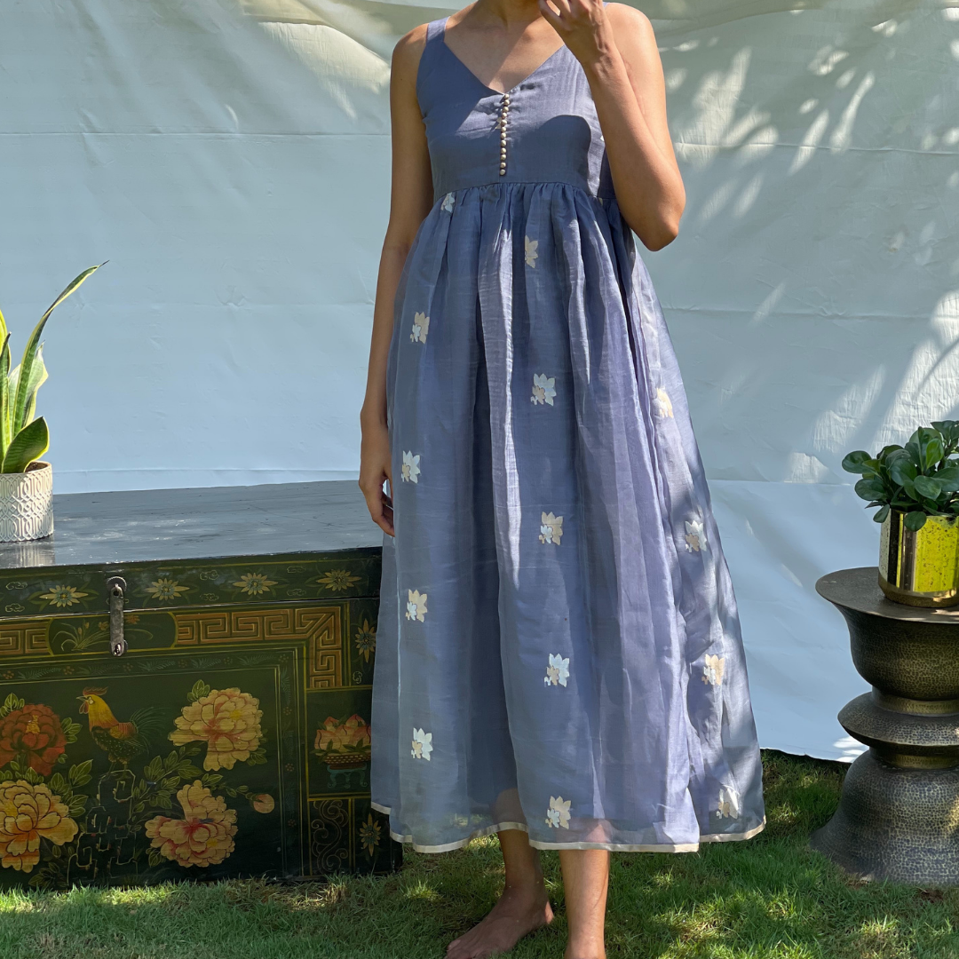 Dusk blue fit and flare midi dress bronze potli buttons, thick straps and a V neck