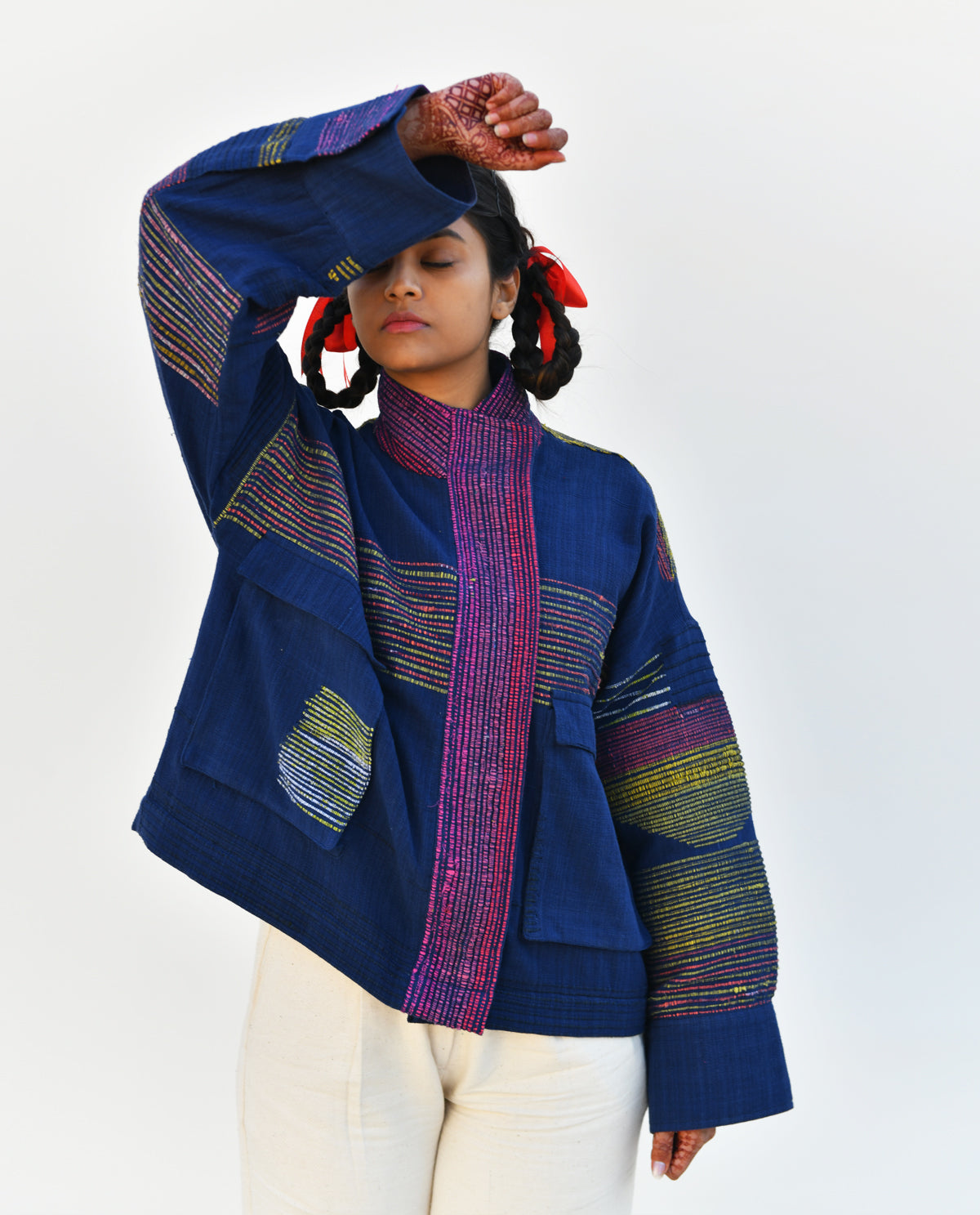 Upcycled Jacket matches the silhouette of a kimono and is handwoven in an extra weft technique.