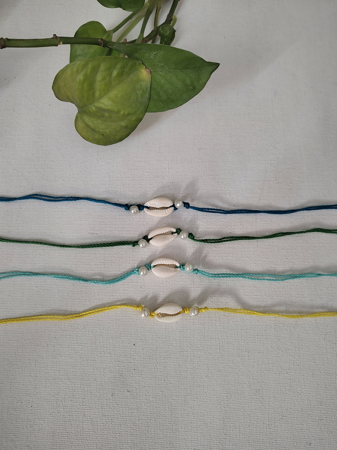Set of 4 White Bead Rakhis