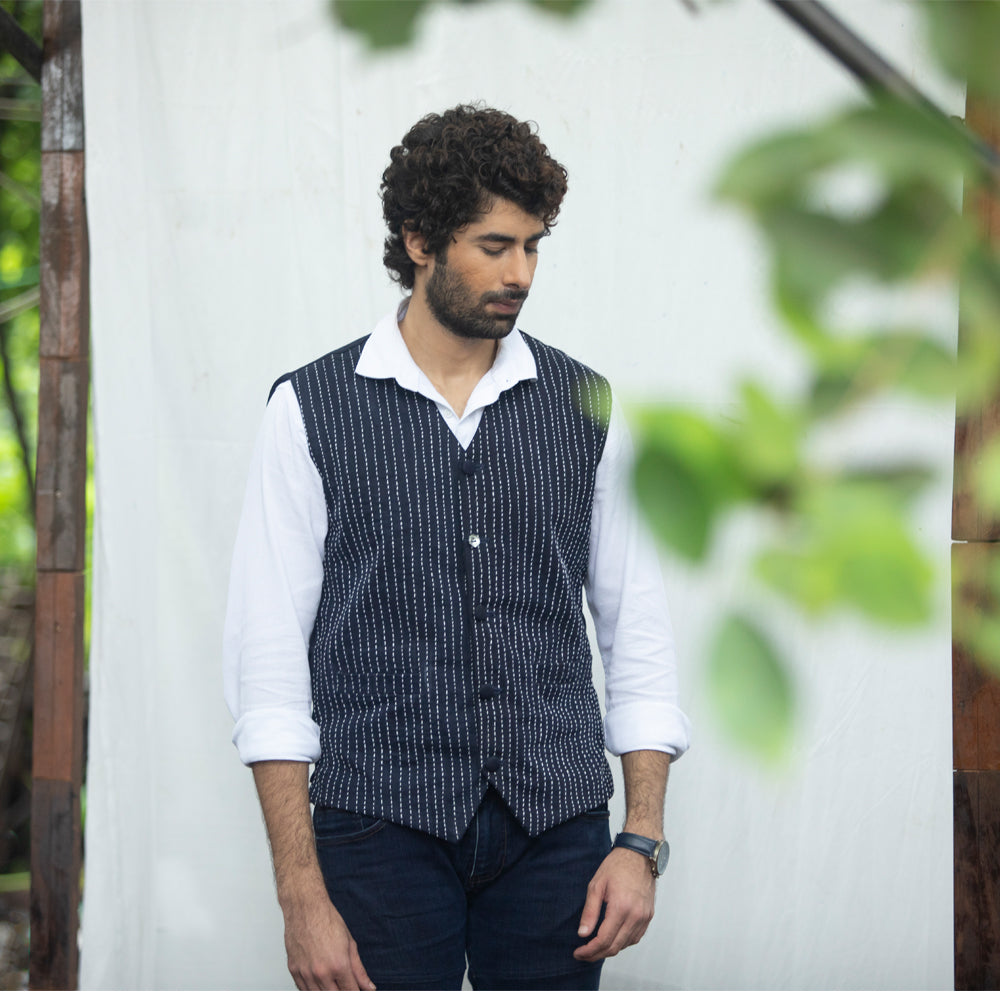 denim vest enhanced with intricate Kantha made from two pairs of jeans.