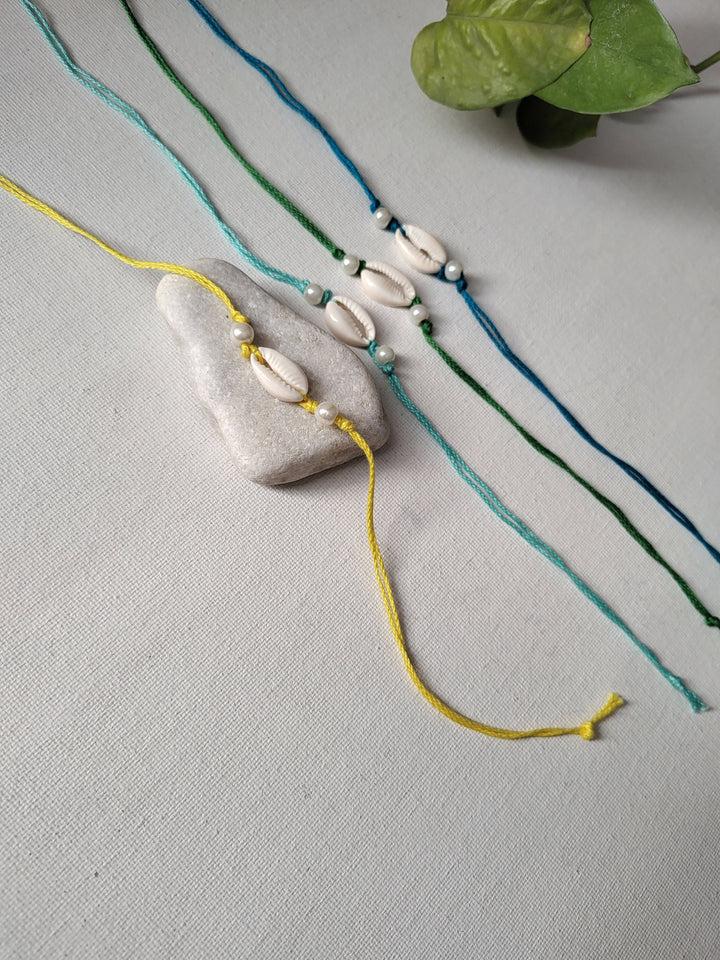 Set of 4 White Bead Rakhis