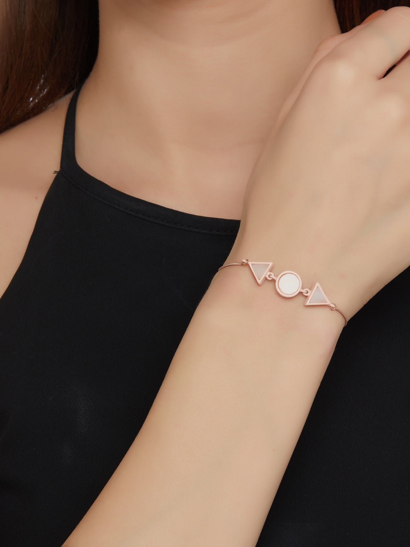 Using recycled metal and reclaimed glass with rose gold.