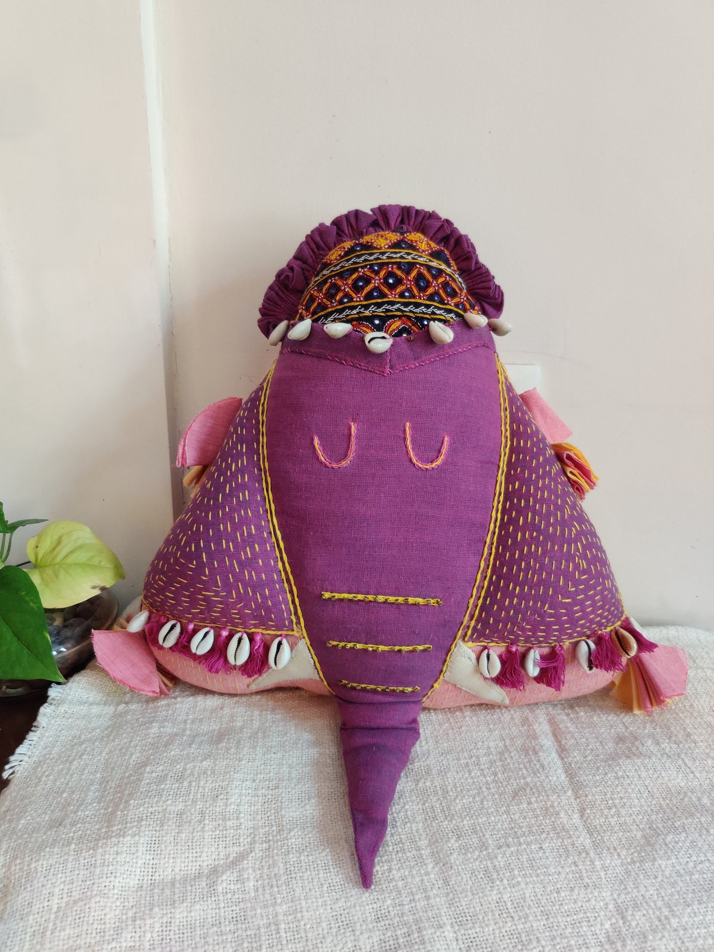 Elephant shaped purple cushion
