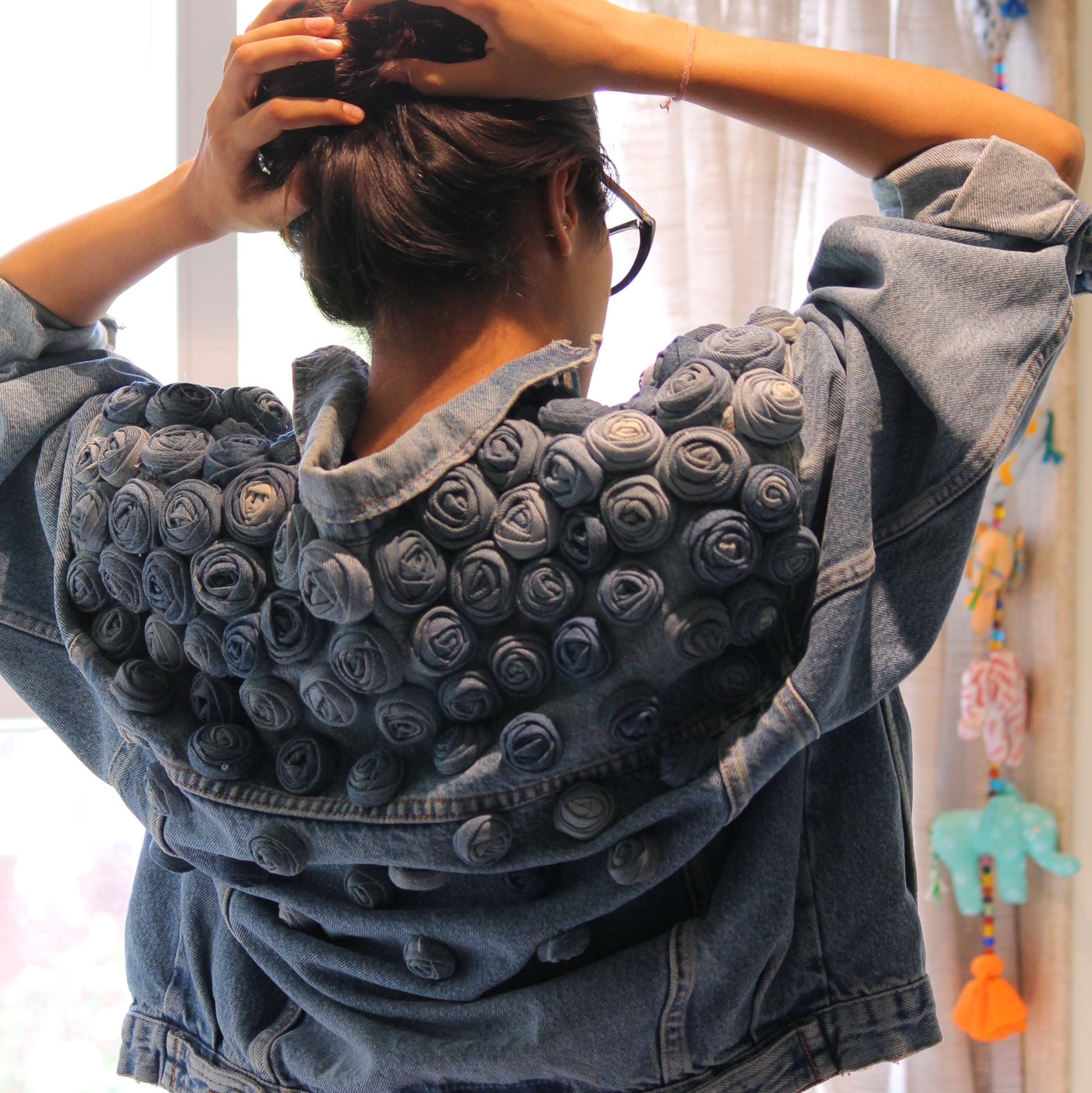 denim rose jacket is made out of fabric scraps