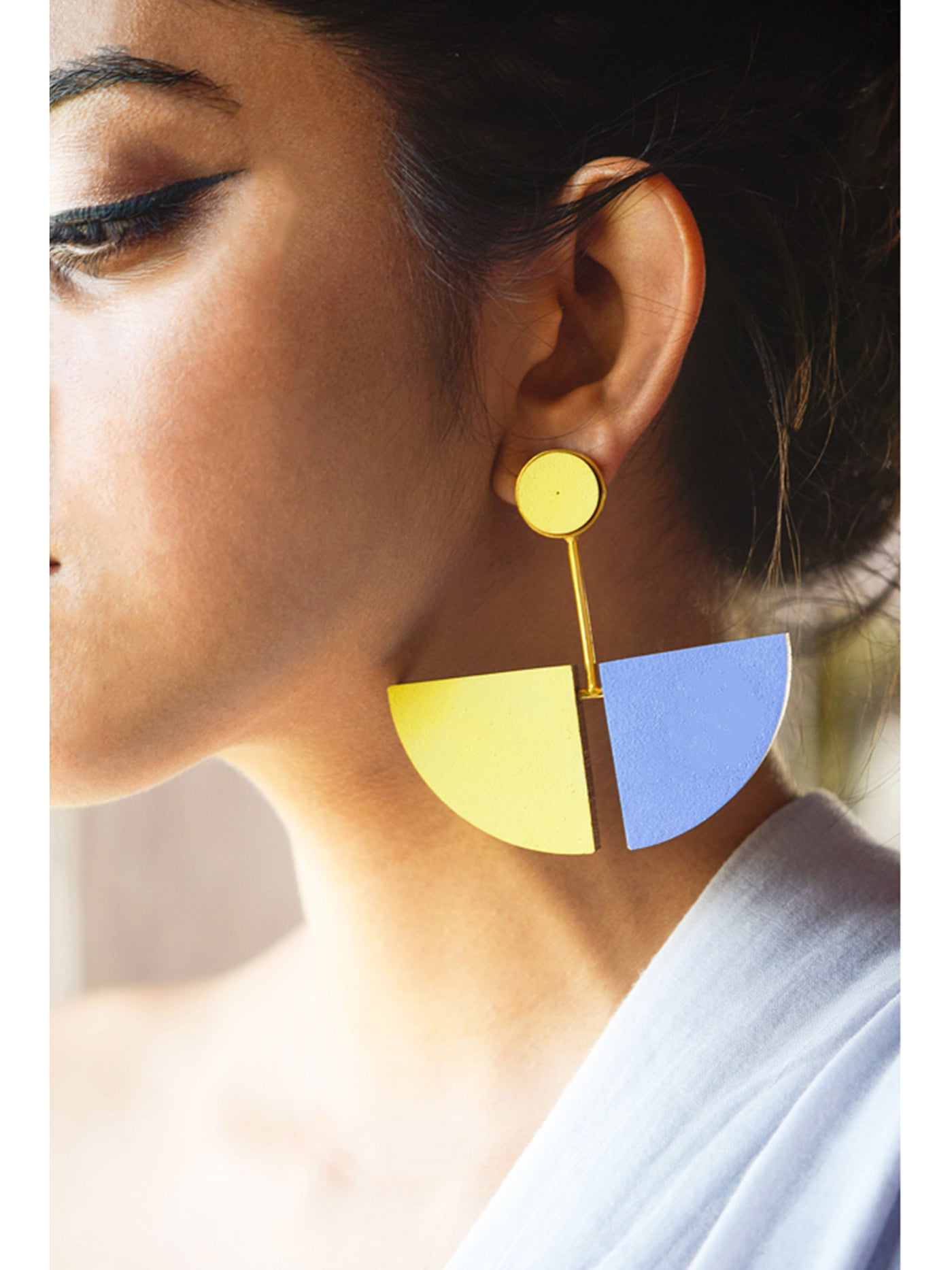 Earrings in Blue and Yellow handcrafted using reclaimed teak wood and gold plated brass.
