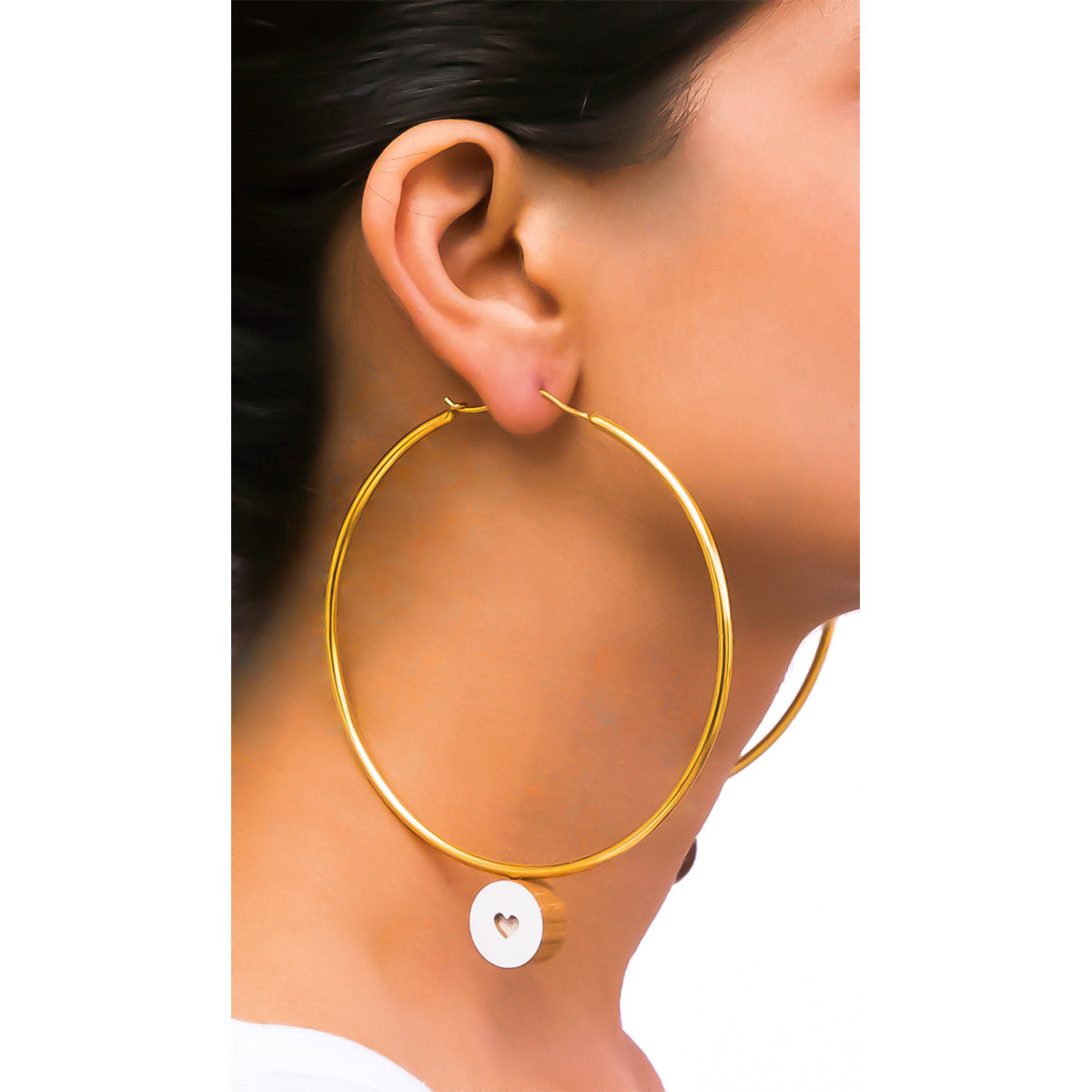 The earrings are handcrafted using reclaimed teak wood and gold plated brass.