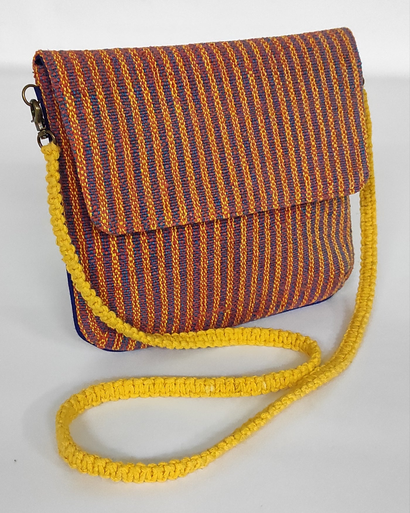 Red Sling Bag handcrafted with handwoven paper yarn and cotton.