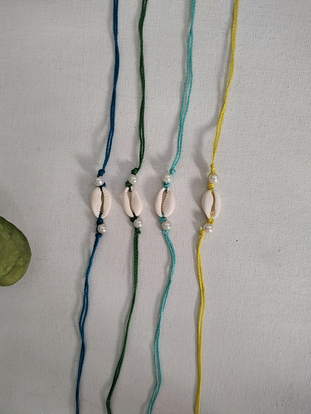 Set of 4 White Bead Rakhis
